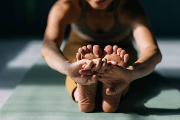 People practicing together at a group yoga session with analytics dashboard