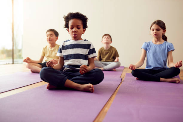 People practicing together at a group yoga session