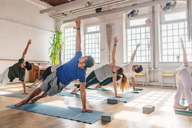 People practicing together at a group yoga session